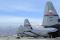 Prepped for the next mission, a line of C-130J Super Hercules wait on the flightline at Bagram Airfield, Afghanistan.