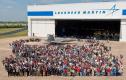 From 1997 to 2012, Lockheed Martin built and delivered 195 Raptors to the US Air Force, which included nine test aircraft. Here, some of the 1,000 people in attendance at the final delivery ceremony on 2 May 2012 stand around the milestone aircraft, Raptor 4195. They represent all the people of Team Raptor in government and industy across the country who had a part in building the F-22 fleet.