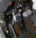 While the instrumentation was basic and analog, the YF-16 cockpit was the first to combine several features to improve high-g operations, including a head-up display, reclined ejection seat, and sidestick controllers.  It also featured a hands-on throttle and stick philosophy that allows pilots to focus their attention on the tactical situation outside the aircraft instead of on switches inside the aircraft.