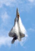23. Dobbins ARB, Georgia, 2008: “This is Maj. ‘Max’ Moga, the F-22 Demonstration Team pilot, showing what the Raptor can do at an airshow. I like this shot because you can see the aircraft in afterburner, the glint off the canopy, and the condensation forming on the Raptor’s wings during a vertical climb.”