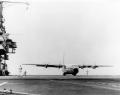 On 8 November 1963, after making the three warm-up touch-and-go landings, Lt. Jim Flatley was cleared for the first full stop landing. The aircraft stopped in 275 feet, actually short of where the number four arresting cable would have been lying. Here, the aircraft is readied for takeoff on the deck of the Forrestal after a full stop landing.