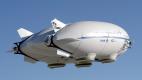 The hybrid airship demonstrator, called P-791, is 123 feet long, fifty-three feet wide, and thirty feet high, was built in 2005. First flight came on 31 January 2006. Company test pilot Eric Hansen made the first two flights and was followed by Bill Francis. The pilots sat side by side in an enclosed gondola with flight engineer Tim Blunck. A total of six flights, each about thirty minutes long, were carried out in the P-791 test program. The tests were mostly ground handling demonstrations. When out of ground effect, the airship crew remained in the traffic pattern at Palmdale, staying below 2,000 feet.