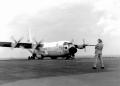 In addition to testing the basic feasibility of landing a Hercules on an aircraft carrier, the project was also designed to make landings at increasingly heavier weights to determine how large a payload a C-130 might safely bring aboard. Because the aircraft was a tanker, simply adding additional fuel increased the gross weight of the aircraft. Here, the deck crew adds fuel to the KC-130's fuselage tank.