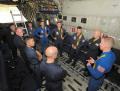 Maj. Drew Hess, the lead pilot for Fat Albert, conducts the crew briefing prior to the final show of 2009 in Bert’s cargo compartment. This was not only Bert’s last JATO takeoff, it was Hess’ final show with the Blue Angels.