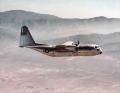 The first flight of the YC-130 came on 23 August 1954. During the sixty-one minute flight, the aircraft was flown from Burbank to the Air Force Flight Test Station at nearby Edwards AFB. This color shot was taken from the P2V Neptune used as a chase aircraft.