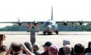The assembled crowd of about 200 people at the retirement ceremony for C-130E 61-2358 watched as the final flight crew was introduced. The augmented crew then took their stations, and the aircraft's four T56-A-7 engines were started for the last time. With four props turning, the C-130E was marshalled out of its parking spot.