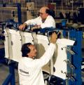 2 November 1995: Assembly of the first flyable F-22 begins at Lockheed Martin Aeronautical Systems in Marietta as workers load parts for the nose landing gear wheel well into an assembly fixture.