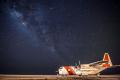 A US Coast Guard HC-130H Hercules aircraft assigned to CGAS Clearwater, Florida, sits parked under the stars on the tarmac in Guantánamo Bay, Cuba, on 15 May 2013.