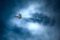 An F-22 Raptor cuts through the clouds during the 2015 Heritage Flight Training and Certification Course on 1 March 2015, at Davis-Monthan AFB, Arizona. The annual aerial demonstration training event, held at Davis-Monthan AFB since 2001, providies civilian and military pilots the opportunity to practice flying in formation for the upcoming air show season.