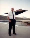 Denys Overholzer, a Lockheed mathematian and engineer, led the team that proved the concept of stealth using faceted surfaces. He shown in front of the F-117 radar cross section pole model at the Lockheed test facility in Hellendale, California.