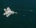 22 September 2003: Lockheed Martin test pilot James Brown makes the first rolling high-g AIM-9 shot (Raptor 03).